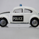 Illustration for article titled Aw. The bad guys got away again! Husky 1:64 Volkswagen 1300 Police